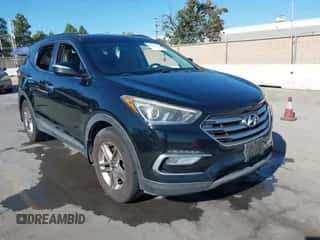 2018 Hyundai Santa Fe 2.4L z VIN 5NMZU3LB1JH098578, wystawiony jako IAAI lot #43506378 z przebiegiem 126 318 mil mil oraz . Historia ofert i sprzedaży dostępna na DreamBid. Obrazek 1.