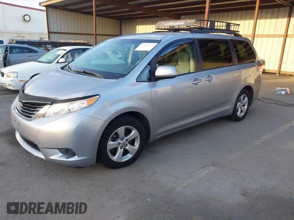 2014 Toyota Sienna LE AAS with VIN 5TDKK3DC0ES457615, listed as a IAAI auction lot 43502655 with 146,897 mi miles and . Bid and sale history available at DreamBid. Image 17.