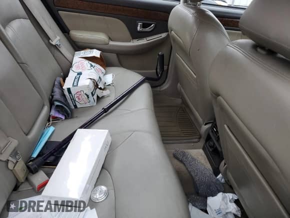 2005 Hyundai XG с VIN KMHFU45E45A382735, выставлен на аукционе Copart как лот 56143445 с пробегом 127 188 миль миль и Списание • Salvage title. История ставок и продаж доступна на DreamBid. Изображение 10.