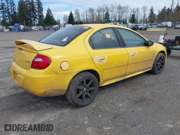 2003 Dodge Neon Highline z VIN 1B3ES46C83D244096, wystawiony jako IAAI lot #41899409 z przebiegiem 145 659 mil mil oraz . Historia ofert i sprzedaży dostępna na DreamBid. Obrazek 4.