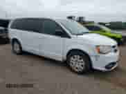 2018 Dodge Grand Caravan SE Plus with VIN 2C4RDGBG8JR304733, listed as a Copart auction lot 70992905 with 339,291 mi miles and Salvage title. Bid and sale history available at DreamBid. Image 4.