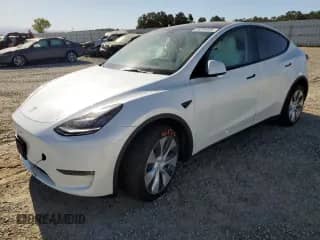 2022 Tesla Model Y Long Range с VIN 7SAYGDEE8NF485932, выставлен на аукционе Copart как лот 65284695 с пробегом 21 398 миль миль и Списание • Salvage title. История ставок и продаж доступна на DreamBid. Изображение 1.