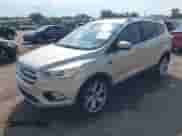 2017 Ford Escape Titanium with VIN 1FMCU9J9XHUD90656, listed as a IAAI auction lot 43216695 with 109,897 mi miles and . Bid and sale history available at DreamBid. Image 2.