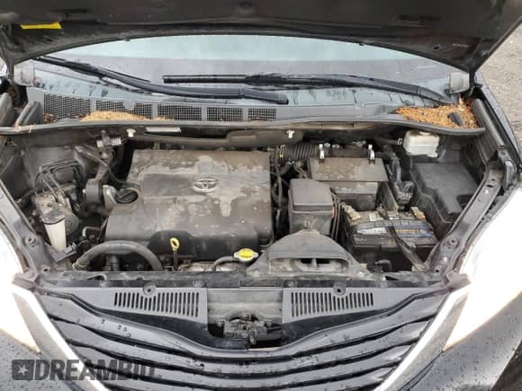 2014 Toyota Sienna LE with VIN 5TDKK3DC6ES455352, listed as a Copart auction lot 82415215 with 180,284 mi miles and Salvage title. Bid and sale history available at DreamBid. Image 12.