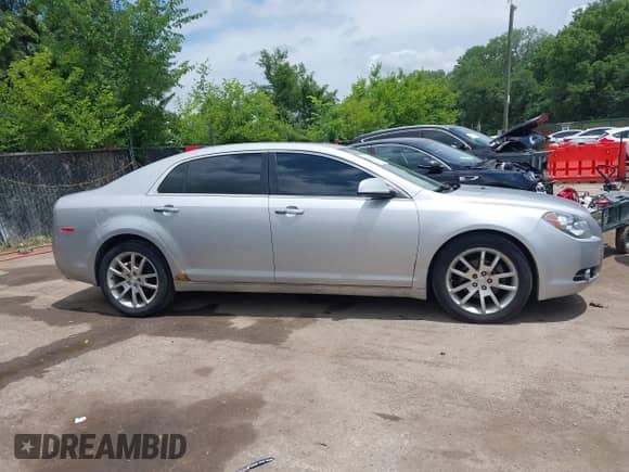 2012 Chevrolet Malibu LTZ z VIN 1G1ZG5E79CF270070, wystawiony jako IAAI lot #42496964 z przebiegiem 206 551 mil mil oraz . Historia ofert i sprzedaży dostępna na DreamBid. Obrazek 13.