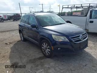 2011 Volkswagen Tiguan SE with VIN WVGAV7AX7BW530357, listed as a IAAI auction lot 42740821 with 170,636 mi miles and . Bid and sale history available at DreamBid. Image 1.