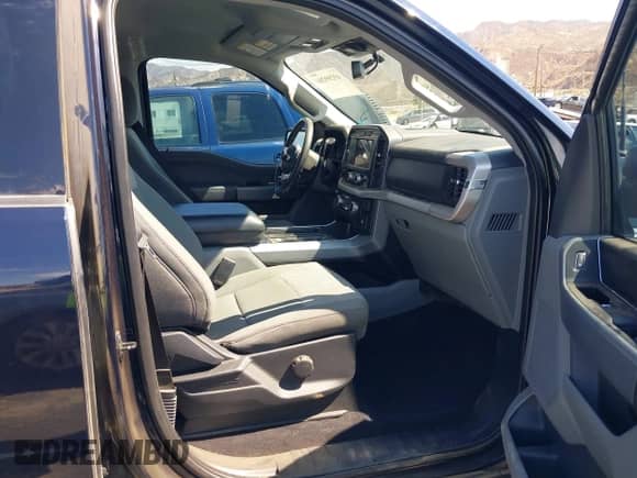 2023 Ford F-150 XLT с VIN 1FTFW1E89PKE05060, выставлен на аукционе IAAI как лот 43299204 с пробегом 79 389 миль миль и . История ставок и продаж доступна на DreamBid. Изображение 5.