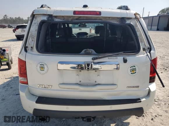 2011 Honda Pilot Touring с VIN 5FNYF3H93BB053642, выставлен на аукционе Copart как лот 71074825 с пробегом 171 403 миль миль и Списание • Salvage title. История ставок и продаж доступна на DreamBid. Изображение 6.