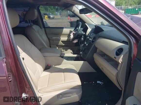 2014 Honda Pilot EX-L with VIN 5FNYF4H77EB055015, listed as a IAAI auction lot 42184434 with 161,454 mi miles and . Bid and sale history available at DreamBid. Image 5.