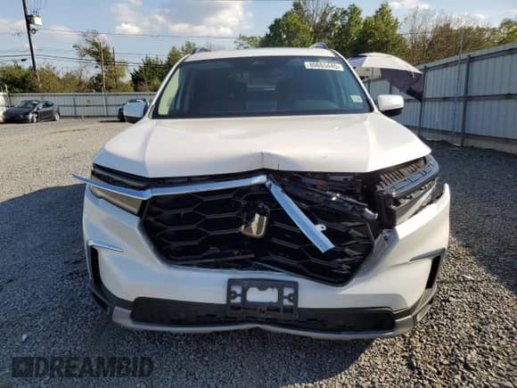 2025 Honda Pilot Touring с VIN 5FNYG1H76SB044787, выставлен на аукционе Copart как лот 80685445 с пробегом 4 493 миль миль и Списание • Salvage title. История ставок и продаж доступна на DreamBid. Изображение 5.