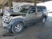 2007 Dodge Nitro SXT with VIN 1D8GT28K57W596531, listed as a Copart auction lot 66501035 with 163,914 mi miles and Salvage title. Bid and sale history available at DreamBid. Image 1.