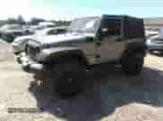 2014 Jeep Wrangler Sport with VIN 1C4AJWAG1EL140354, listed as a IAAI auction lot 42605094 with 151,132 mi miles and . Bid and sale history available at DreamBid. Image 2.