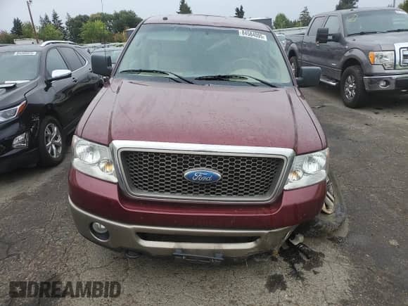 2006 Ford F-150 XLT with VIN 1FTPX14596NA49697, listed as a Copart auction lot 84584095 with 165,083 mi miles and Salvage title. Bid and sale history available at DreamBid. Image 5.