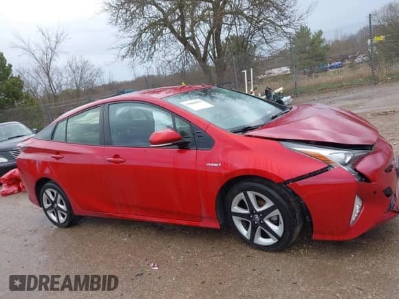 2017 Toyota Prius Two z VIN JTDKARFU8H3527802, wystawiony jako IAAI lot #42068099 z przebiegiem 102 152 mil mil oraz . Historia ofert i sprzedaży dostępna na DreamBid. Obrazek 13.