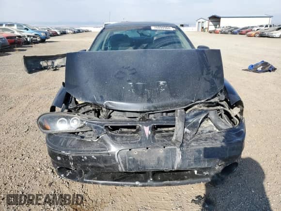 2001 Pontiac Grand Am GT z VIN 1G2NW12E31M584119, wystawiony jako Copart lot #76099984 z przebiegiem 293 559 mil mil oraz Czysty tytuł • Clean title. Historia ofert i sprzedaży dostępna na DreamBid. Obrazek 5.