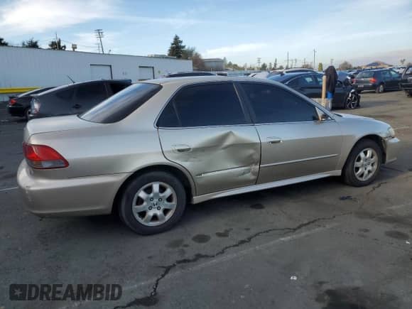 2002 Honda Accord EX with VIN JHMCG66012C002097, listed as a Copart auction lot 41604385 with 235,329 mi miles and Clean title. Bid and sale history available at DreamBid. Image 3.
