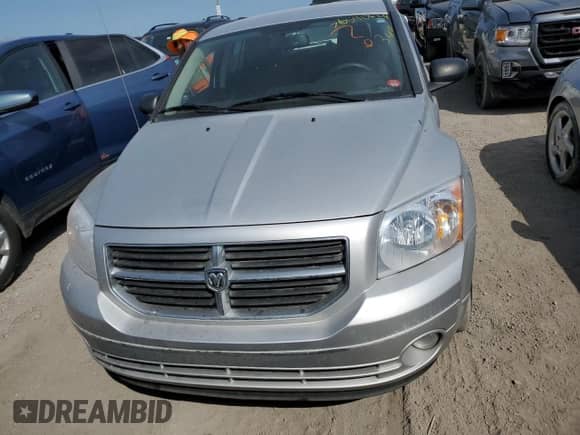 2011 Dodge Caliber Mainstreet с VIN 1B3CB3HA3BD116036, выставлен на аукционе Copart как лот 76590624 с пробегом Не указан миль и Списание • Salvage title. История ставок и продаж доступна на DreamBid. Изображение 5.