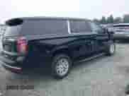 2023 Chevrolet Suburban LT z VIN 1GNSKCKD8PR215417, wystawiony jako IAAI lot #43117847 z przebiegiem 63 479 mil mil oraz . Historia ofert i sprzedaży dostępna na DreamBid. Obrazek 4.