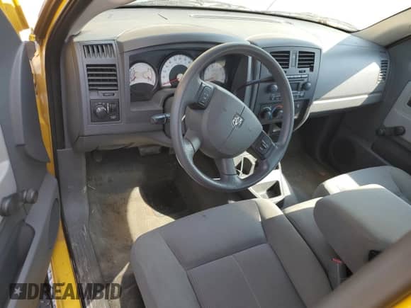 2006 Dodge Dakota ST с VIN 1D7HE22N06S557342, выставлен на аукционе Copart как лот 72053485 с пробегом 66 747 миль миль и На запчасти • Non repairable. История ставок и продаж доступна на DreamBid. Изображение 8.