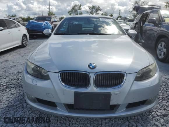 2009 BMW 3 Series 328i with VIN WBAWR33599P460929, listed as a Copart auction lot 84867615 with 123,688 mi miles and Salvage title. Bid and sale history available at DreamBid. Image 5.