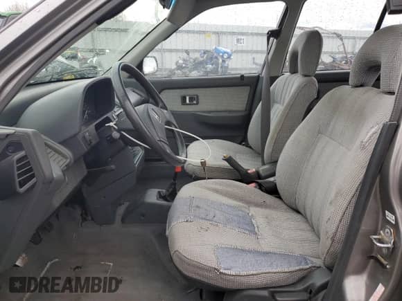 1990 Honda Civic with VIN JHMEE2754LS010638, listed as a Copart auction lot 85169464 with 167,566 mi miles and Salvage title. Bid and sale history available at DreamBid. Image 7.