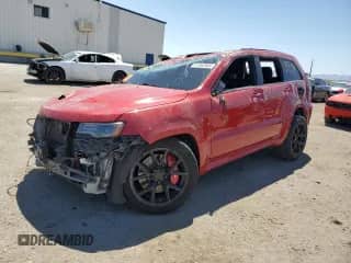 2014 Jeep Grand Cherokee SRT-8 z VIN 1C4RJFDJ7EC202611, wystawiony jako Copart lot #51462945 z przebiegiem 127 849 mil mil oraz Szkoda całkowita • Salvage title. Historia ofert i sprzedaży dostępna na DreamBid. Obrazek 1.