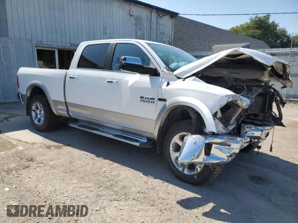 2014 Ram 1500 Laramie z VIN 1C6RR7VM8ES288421, wystawiony jako Copart lot #68515735 z przebiegiem 116 639 mil mil oraz Szkoda całkowita • Salvage title. Historia ofert i sprzedaży dostępna na DreamBid. Obrazek 4.