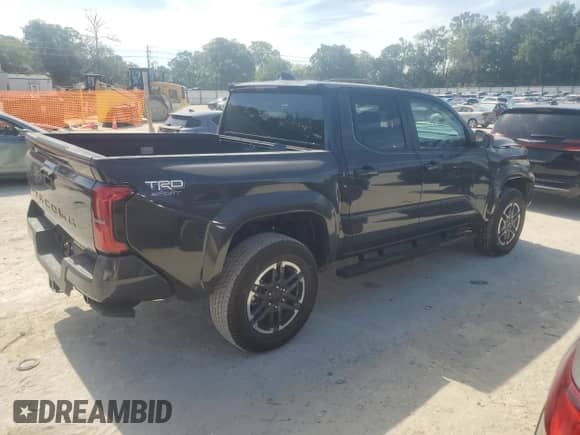 2024 Toyota Tacoma SR5 with VIN 3TMKB5FN5RM020760, listed as a Copart auction lot 61219275 with 4,143 mi miles and Non repairable. Bid and sale history available at DreamBid. Image 3.