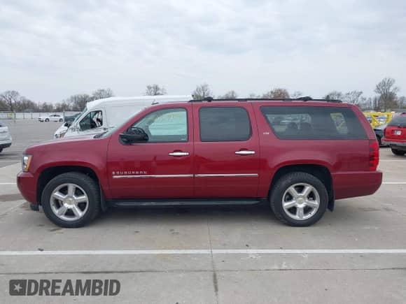 2009 Chevrolet Suburban LTZ z VIN 1GNFK36309J105434, wystawiony jako IAAI lot #42062907 z przebiegiem 132 674 mil mil oraz . Historia ofert i sprzedaży dostępna na DreamBid. Obrazek 14.
