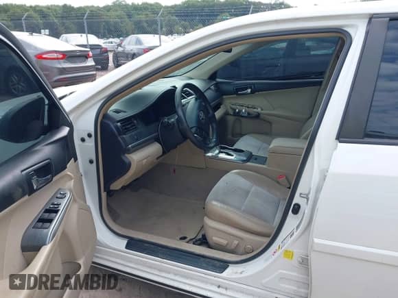 2012 Toyota Camry XLE with VIN 4T1BD1FK1CU041015, listed as a IAAI auction lot 43238530 with 232,047 mi miles and . Bid and sale history available at DreamBid. Image 5.