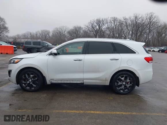 2016 Kia Sorento SXL z VIN 5XYPKDA59GG116070, wystawiony jako IAAI lot #41503521 z przebiegiem 108 516 mil mil oraz . Historia ofert i sprzedaży dostępna na DreamBid. Obrazek 14.