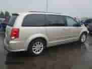 2013 Dodge Grand Caravan SXT with VIN 2C4RDGCG2DR741033, listed as a Copart auction lot 82282715 with 88,444 mi miles and Salvage title. Bid and sale history available at DreamBid. Image 3.