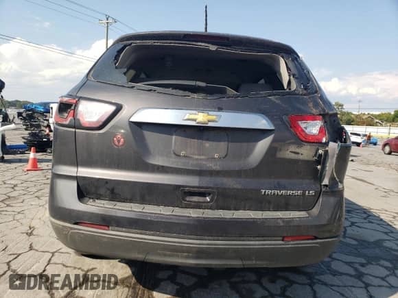 2016 Chevrolet Traverse LS z VIN 1GNKRFEDXGJ288151, wystawiony jako Copart lot #70477975 z przebiegiem 214 685 mil mil oraz Szkoda całkowita • Salvage title. Historia ofert i sprzedaży dostępna na DreamBid. Obrazek 6.