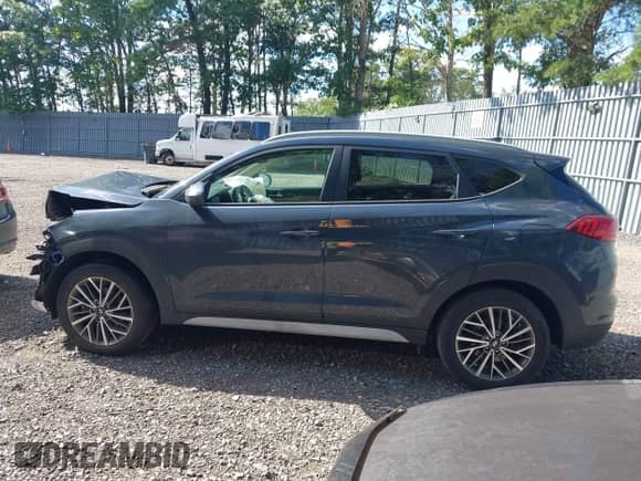 2021 Hyundai Tucson Sport with VIN KM8J3CAL3MU380600, listed as a IAAI auction lot 43050098 with 37,378 mi miles and . Bid and sale history available at DreamBid. Image 14.