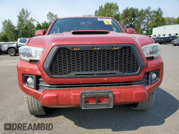 2016 Toyota Tacoma TRD Sport с VIN 5TFRZ5CN8GX009550, выставлен на аукционе Copart как лот 70159565 с пробегом 118 596 миль миль и Чистый • Clean title. История ставок и продаж доступна на DreamBid. Изображение 5.