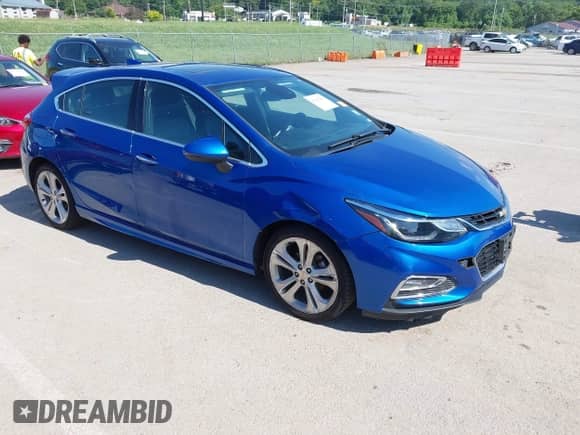 2017 Chevrolet Cruze Premier z VIN 3G1BF6SM3HS560456, wystawiony jako IAAI lot #42542260 z przebiegiem 156 855 mil mil oraz . Historia ofert i sprzedaży dostępna na DreamBid. Obrazek 1.