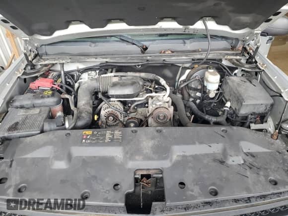 2013 Chevrolet Silverado 1500 Work Truck z VIN 1GCNKPEX0DZ240892, wystawiony jako Copart lot #63041415 z przebiegiem 90 866 mil mil oraz Szkoda całkowita • Salvage title. Historia ofert i sprzedaży dostępna na DreamBid. Obrazek 11.
