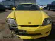 2005 Hyundai Tiburon GT z VIN KMHHN65F75U170498, wystawiony jako Copart lot #58391985 z przebiegiem 190 374 mil mil oraz Szkoda całkowita • Salvage title. Historia ofert i sprzedaży dostępna na DreamBid. Obrazek 5.