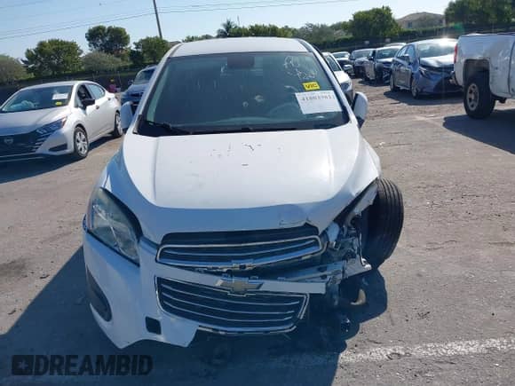 2016 Chevrolet Trax LS with VIN 3GNCJKSB7GL264728, listed as a IAAI auction lot 41803981 with 104,256 mi miles and . Bid and sale history available at DreamBid. Image 12.