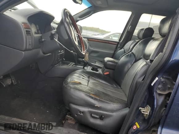 2004 Jeep Grand Cherokee Overland с VIN 1J8GW68JX4C264949, выставлен на аукционе Copart как лот 82306755 с пробегом 258 711 миль миль и Списание • Salvage title. История ставок и продаж доступна на DreamBid. Изображение 7.