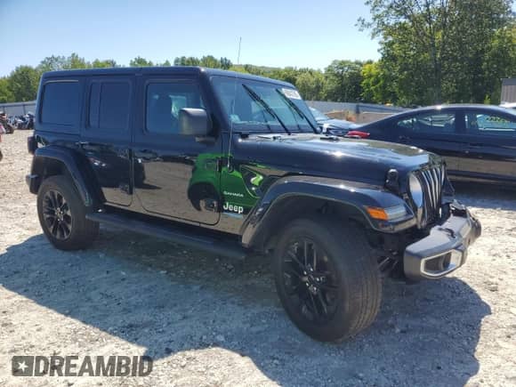 2021 Jeep Wrangler Unlimited Sahara with VIN 1C4JJXP69MW864259, listed as a Copart auction lot 69842705 with 36,936 mi miles and Salvage title. Bid and sale history available at DreamBid. Image 4.
