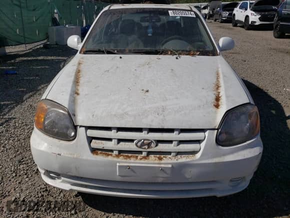 2005 Hyundai Accent GLS с VIN KMHCG45C55U664731, выставлен на аукционе Copart как лот 80205574 с пробегом 170 335 миль миль и Списание • Salvage title. История ставок и продаж доступна на DreamBid. Изображение 5.