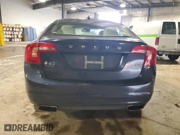 2015 Volvo S60 T5 Drive-E Premier with VIN YV126MFK9F1354636, listed as a Copart auction lot 61228855 with 143,125 mi miles and Salvage title. Bid and sale history available at DreamBid. Image 6.
