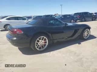 2004 Dodge Viper SRT-10 with VIN 1B3JZ65Z54V100772, listed as a Copart auction lot 48879135 with 33,305 mi miles and Salvage title. Bid and sale history available at DreamBid. Image 3.