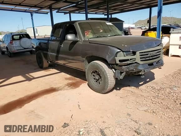 2003 GMC Sierra 1500 SLE z VIN 2GTEC19V831300489, wystawiony jako Copart lot #82320705 z przebiegiem 146 528 mil mil oraz Szkoda całkowita • Salvage title. Historia ofert i sprzedaży dostępna na DreamBid. Obrazek 13.