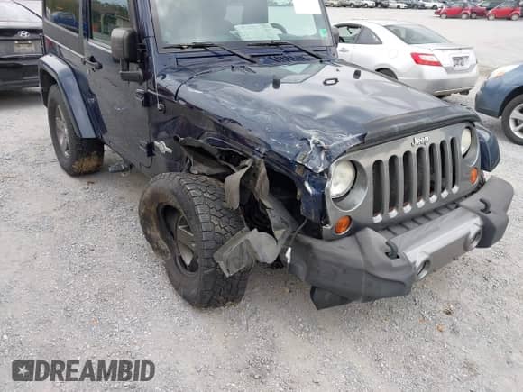 2013 Jeep Wrangler Sport with VIN 1C4AJWAG7DL565091, listed as a IAAI auction lot 43267062 with 192,629 mi miles and . Bid and sale history available at DreamBid. Image 6.