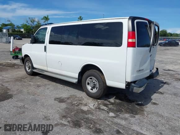2014 Chevrolet Express Passenger LT with VIN 1GAZGYFG8E1130432, listed as a IAAI auction lot 42487756 with 176,418 mi miles and . Bid and sale history available at DreamBid. Image 3.
