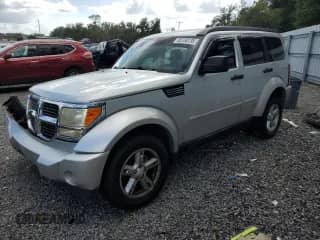 2008 Dodge Nitro SXT with VIN 1D8GU28K48W129101, listed as a Copart auction lot 85730735 with 211,507 mi miles and Salvage title. Bid and sale history available at DreamBid. Image 1.