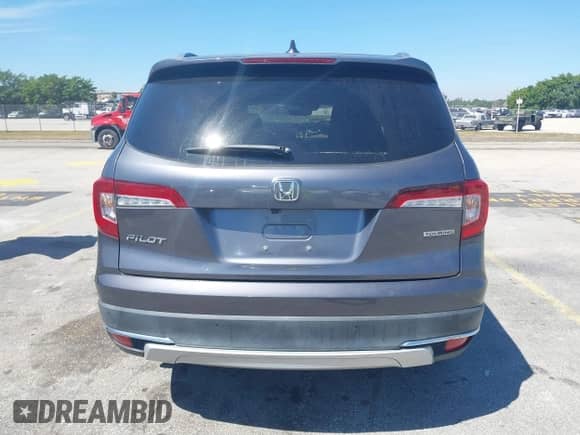 2020 Honda Pilot Touring 8-Passenger z VIN 5FNYF5H90LB000801, wystawiony jako IAAI lot #41865605 z przebiegiem 62 743 mil mil oraz . Historia ofert i sprzedaży dostępna na DreamBid. Obrazek 16.