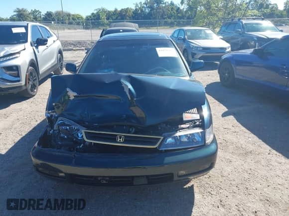 1996 Honda Accord EX z VIN 1HGCE6670TA006564, wystawiony jako IAAI lot #43471466 z przebiegiem 83 465 mil mil oraz . Historia ofert i sprzedaży dostępna na DreamBid. Obrazek 12.